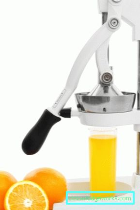 Mekaaninen sitrushedelmien puristinpuristin ja granaattiomena Mekaaninen sitrushedelmien puristinpuristin ja granaattiomena