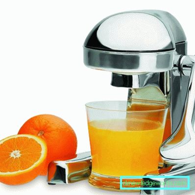 Mekaaninen sitrushedelmien puristinpuristin ja granaattiomena Mekaaninen sitrushedelmien puristinpuristin ja granaattiomena